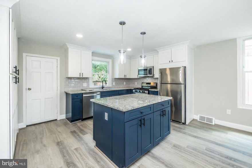 Gorgeous Open-Concept Living: Step into a bright and airy living space featuring brand-new hardwood floors, recessed lighting, and large windows that flood the home with natural light.
State-of-the-Art Kitchen: The heart of this home boasts a sleek, modern kitchen with high-end stainless steel appliances, custom cabinetry, and beautiful quartz countertops. It is perfect for both everyday cooking and entertaining.
Luxurious Bathrooms: Each bathroom has been completely redesigned with contemporary fixtures, stylish tile work, and spa-like amenities, providing a serene retreat for relaxation.
Spacious Bedrooms: Enjoy restful nights in generously sized bedrooms, each offering ample closet space and designer touches throughout.
Modern Conveniences: This home includes updated electrical and plumbing and energy-efficient windows to keep you comfortable year-round.
Huge Backyard: This yard is so large the possibilities are endless. You could build a deck, play area, and pool
