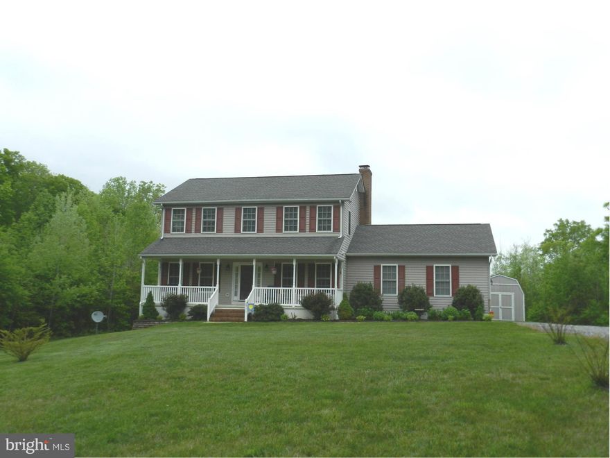 Country Colonial situated on a private 5 acre lot. Full front porch with beautiful mature landscape. Over 2,000 finished sqft w/ 2 car garage, no maintenance deck over looking lush wooded back yard. Modern kitchen w/ stainless steel appliances, center island, recessed lighting & open floor plan. Master Suite w/ wi closet, oversized bath w/  jetted soaker tub w/sep shower and his and her vanities.