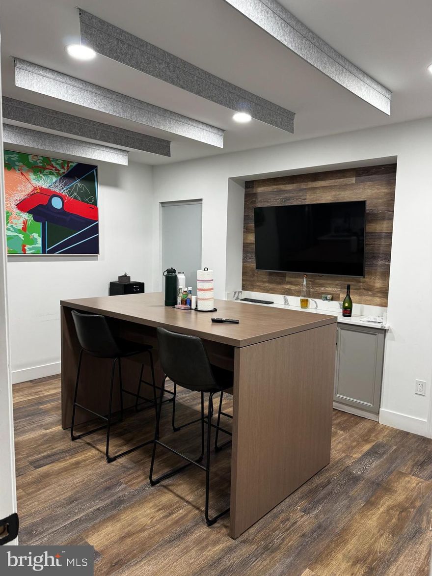 Multi-use industrial/flex/commercial space with warehouse and beautifully built out office space. Approximately 2,900 SF (1,100 SF of office space, and 1,800 SF two-story warehouse with 400 SPF of mezzanine space). The luxury vinyl plank, marble  and modern wood elements make this end unit build out on of a kind. This end-unit features a professionally designed reception area, three offices, a kitchenette, conference room, lounge area and so much more to seamlessly transition your business into this vibrant corridor of Alexandria. Two assigned parking spaces in front of the unit, plus the condo association offers additional permits/tags for the parking lot.  Quick and easy access to 95/395/495 in busy industrial and retail area just off Edsall Rd. Zoned I-5 (General Industrial) with a wide range of permitted uses.