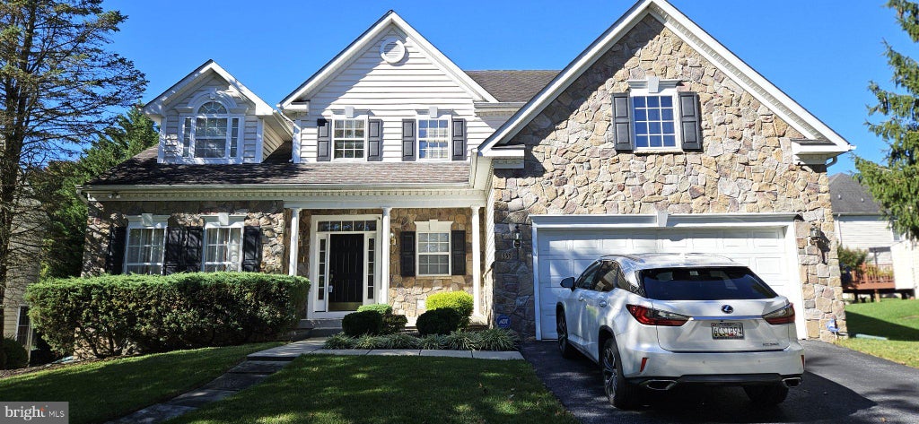 Photo of 855 Queens Park Drive, OWINGS MILLS, MD 21117 (MLS # MDBC2169930)