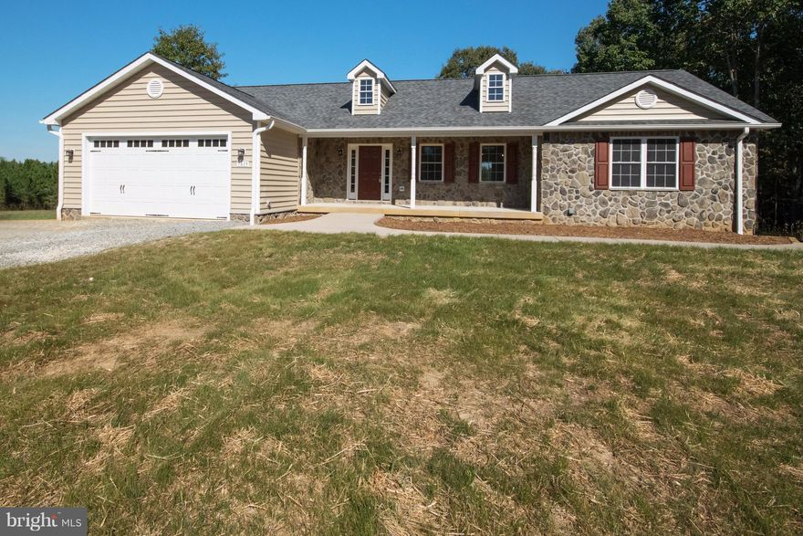 NEW CUSTOM HOME on 4.7 private acres.  4 Bedrooms, 3 Baths, stone fireplace, granite, stainless steel appliance package, maple cabinets, island w/ veg sink and wine rack, tile, dining area w/chandelier, master suite w/ custom tile work in bath, his/hers closets, lower level offers a full kitchen and endless space to entertain or have an in-law suite w/ separate entrance, and safe room.