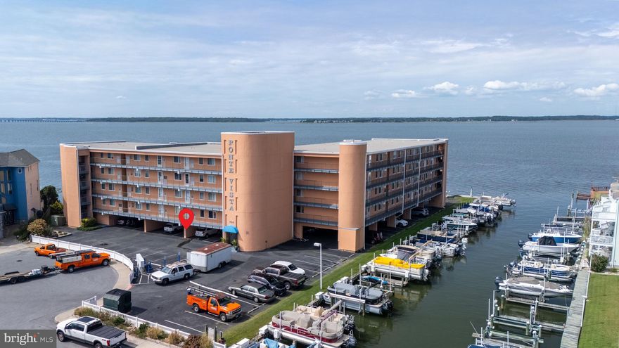 Bayfront building of Ponte Vista, this bayfront 1 bed 1 bath condo offers panoramic views of the Assawoman Bay. Located on the first floor, just steps from the outdoor pool, the open living area combines kitchen, dining, and living space with sliders to a private deck patio with a small gate and seating. Enjoy coastal vibes, daily sunsets, and strong rental income potential. Prime location off 94th Street with easy access to all that Ocean City has to offer.