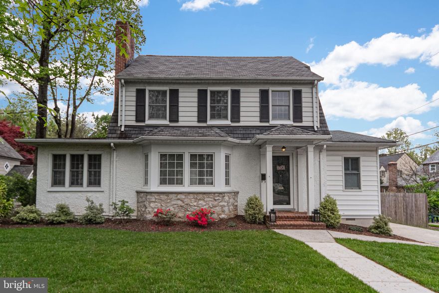Charming Dutch Colonial Revival tucked away on a quiet street in the sought after historic Stoneleigh neighborhood. Beautifully updated this 4 bedroom, 3 bathroom home is truly exceptional. The first floor features open concept living with a spacious living room that leads into the dining room and an airy sunroom.  The light-filled living room features a beautiful fireplace and is perfect for entertaining family and friends. The dining room opens up to a newly renovated kitchen with gleaming white cabinets, counter tops, and new appliances.  The second floor features three bedrooms and 2 bathrooms one of which has just been updated. Bonus third level  bedroom with lots of storage. You'll enjoy outdoor living in the large, private green backyard with an outdoor deck perfect for summer BBQs. Detached 2 car garage.  Welcome home to 6901 Marlborough Road! 3D tour of home here: https://my.matterport.com/show/?m=ywSu8ZS4KJT