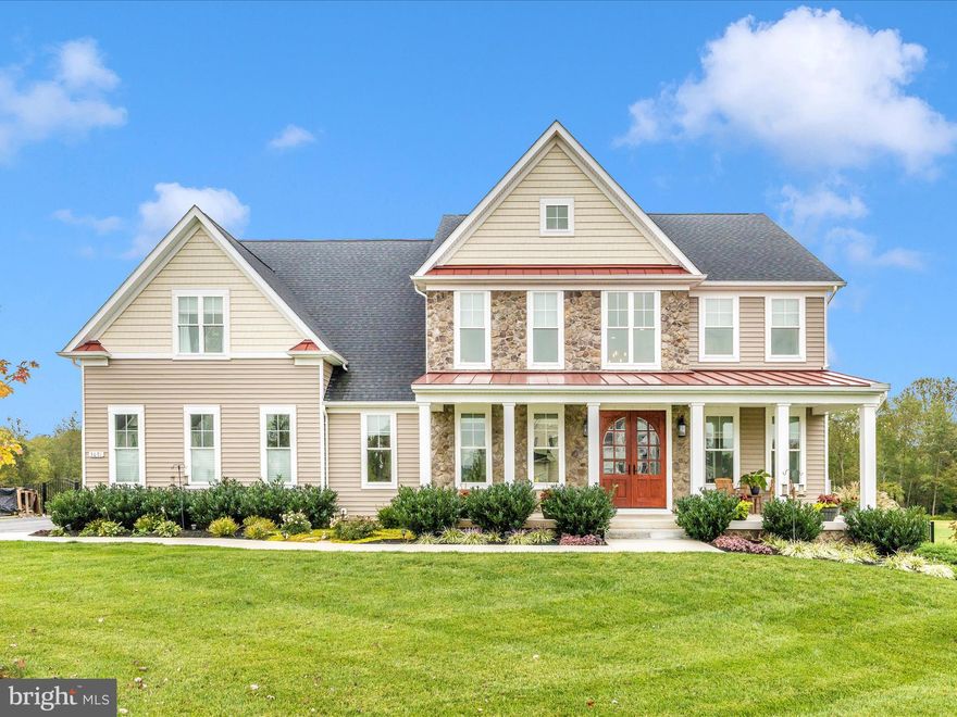 Welcome to Falling Green, a luxurious neighborhood with character, charm, and breathtaking views! This home is nestled in the new section, built in only 2022! This home is sure to impress before you even pull into the driveway. Stunning exterior has beautiful landscaping, a welcoming front porch, and upgraded double front door with decorative arched glass. WOW is the first thing you'll say! Entering into the two story foyer, you get a nice open view of the home. To the left, a spacious dining room. To the right, a perfect home office. The hallway brings you through to a spacious half bath, and tucked away on the main level is a bedroom with full bath, ideal for guests or family members who prefer to stay on the main level. Enormous two story family room is complete with an oversized 60" two story fire place with stone facade, and coiffured ceilings with recessed lighting and a gorgeous ceiling fan. Fireplace has the benefit of being wood burning or gas fired - a simple key can transform depending on your desires! Family room seamlessly flows into the gorgeous gourmet kitchen, with so many luxurious features from the hidden fridge, to the commercial grade Wolf range featuring 4 gas burners, plus a griddle and indoor grill and stunning wooden vent hood! Huge center island has storage on both sides, farmhouse double sink, on demand filtered water through triple stage filter, dishwasher, and stunning hand chiseled-polished edge countertop. Kitchen cabinets feature soft closure doors and drawers, spice drawer, hidden pull out utensil drawer, and tons of storage. Mudroom features butler's pantry, full walk in pantry with pull out drawers and wooden shelves, built in bench with coat hooks, coat closet, and broom/vacuum storage. Mudroom has entrance to 3 car garage, with room for storage and a rough-in for electric vehicle charging station! ALL of this just on the main level!!! Heading upstairs, enjoy the view of the main level again from the catwalk. To the right, two spacious bedrooms that share a Jack and Jill style bathroom with double sinks and private shower room. Across the catwalk, find a 3rd bedroom with private full bathroom and walk in closet. Across the hall, the luxurious laundry room with leathered granite countertops, utility sink, and cabinets for storage! Double size linen closet in the hall, too! Heading down to the primary bedroom suite, find double door entry, a welcome area, and enormous suite complete with dressing area and a sitting area. Barn style door welcomes you into the luxurious primary bath, featuring claw foot soaking tub, double sinks, and two person roman shower! Primary bath accesses the walk in closet with upgraded shelving, drawers, and hanging space! Truly remarkable details throughout! Heading down to the basement, find soaring ceilings, plenty of lights, and wide open space ready for your ideal recreation plans. Plenty of space for theatre room, home gym, and so much more! Plus a rough in for a full bath! Basement features walk up stairs accessed by sliding glass doors, bringing in tons of natural light. Out back, find an open, level yard perfect for playing, gardening, or space to add a pool! Back yard is fully fenced, and backs to trees. Enjoy stargazing Mount Airy's beautiful skies from the back porch, complete with built in heaters n the back porch to enjoy all year round! Solar provides extreme efficiency and cost savings.  Owned with no lease or loan.  This home is absolutely stunning, and just what you've been dreaming of.  Schedule your tour today, and fall in love with Falling Green!