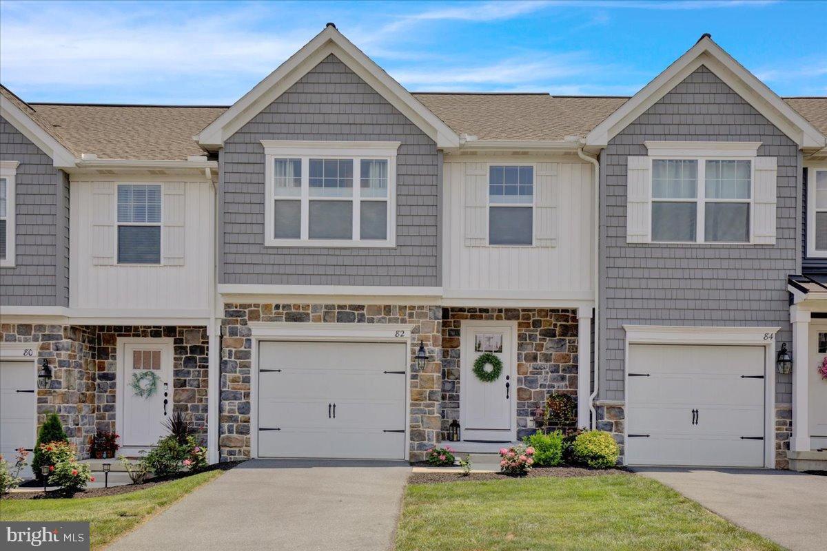 Nestled in the charming Mayapple Woods community, this exquisite townhouse offers a perfect blend of modern comfort and traditional style. Built in 2021, the home features a ton of upgrades (list is in documents), an inviting open floor plan that seamlessly connects the living, dining, and kitchen areas, ideal for both relaxation and entertaining. The kitchen boasts upgraded quartz countertops, an island with seating for 3, and energy-efficient slate appliances (staying with home), making meal prep a delight. Enjoy cozy evenings in the family room off the kitchen, or retreat to the spacious primary suite with a luxurious walk-in shower and ample closet space. Step outside to discover a beautifully maintained exterior with an inviting patio and deck, perfect for enjoying morning coffee or a good book. The property backs onto open common areas, providing a serene backdrop and a sense of community. With lawn care and snow removal included in the association fee, you can spend more time enjoying your home. Mayapple Woods is not just a place to live; it's a vibrant community. Residents benefit from well-maintained sidewalks, street lighting, and access to common grounds. Nearby parks offer recreational opportunities, while local schools are known for their commitment to excellence. With convenient access to public services and amenities, this home is a true sanctuary that balances comfort and community living. Easy commute to Hershey, Lancaster and the turnpike! Experience the warmth and charm of this delightful property-your new home awaits! BEST PRICED HOME IN THE COMMUNITY! TONS OF UPGRADES AND PRICED BELOW THE BASE PRICE OF A NEW KENT MODEL!