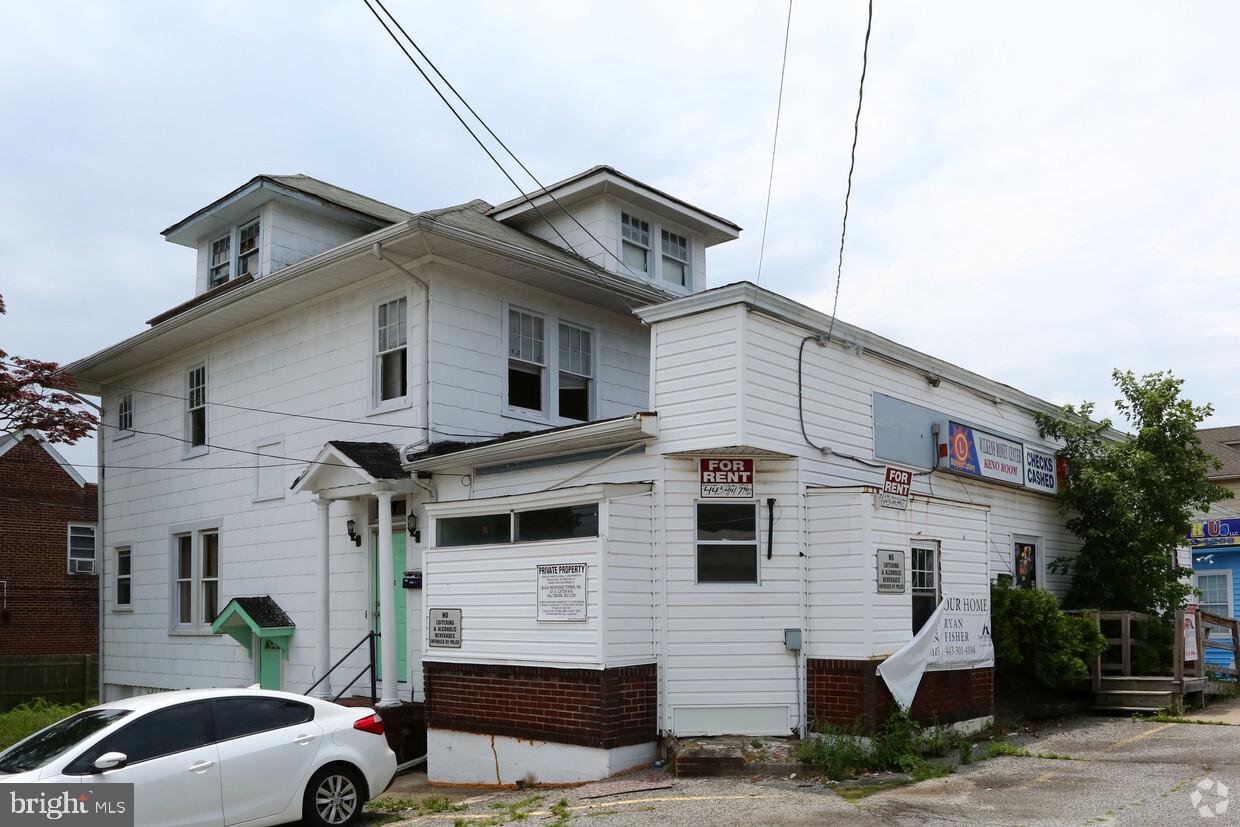 This property is being totally renovated with all new roofing, framing, HVAC, plumbing, electric, floor covering; trim; doors; paint; windows; insulation and more. There are two buildings: the primary structure is being built-out to accommodate four separate buisnesses on the main level (although owner build-to-suit if desired): Suite A = 300 SF and is one large room ($600/month); Suite B = 300 SF and is also one large room ($600/month); Suite C = 450 SF ($900/month) and Suite D = 891 SF ($1,782/mont). The second floor is being built out as a two bedroom apt. but can also function as office space and is 1,070 SF ($1,200/month). The basement is built out as two 2 bedroom apts. and each are about $1,500/month. The small 561 SF outbuilding is built out as a crab shack and snowball stand ($1,403/month).