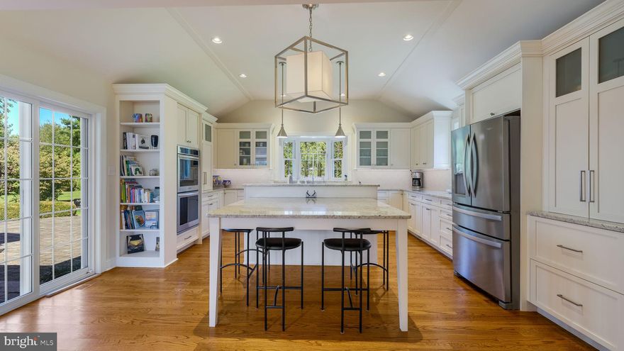 You must see this spectacular sprawling one of a kind, custom ranch home with over 3100 sf of one floor living on 1.65 acres, minutes from Doylestown Borough! Enter this spacious home to see the striking great room with its open floor plan, sun filled rooms, hardwood floors, vaulted ceilings and a magnificent floor-to-ceiling marble surrounded gas fireplace. The amazing chef’s grade kitchen includes a 6 burner Wolf stove, double oven, high quality cabinets with built in organizers, granite counter tops, a built-in island that easily seats 6 and a walk in pantry. The owner’s suite features vaulted ceilings, his and her closets with built in shelving and a newly renovated bathroom with zero entry shower and heated floor. There are 3 additional generous sized bedrooms, with ceiling fans, custom mill-work and walk-in closets, and an office that share a hall bath. The large laundry room has built in cabinetry and a sink. All this plus a finished basement! The turn around driveway provides access to a two car attached garage and a 1 car detached garage with electric. Out back there is an Anthony Sylvan salt water pool with a sun shelf and a large spa  and an  EP Henry patio with landscape lighting . The outdoor oasis is completed with extensive landscaping, tons of privacy with a fenced in yard and a whole house generator. Newer septic, water filtration system with UV and reverse osmosis and a newer roof. Nothing to do except unpack!