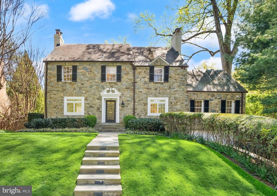 Just Listed in coveted Spring Valley! Stunning Fieldstone Colonial with gorgeous curb appeal and a layout that delivers at every level. Five fireplaces, a fabulous renovated kitchen with peninsula/island and adjoining family/breakfast room, private library, 5 bedrooms, 4.5 baths, and a spectacular walk-out lower level with family room and exercise room. The finished top floor adds a bonus office/game room for even more versatile living. Expansive deck overlooks a gorgeous, private backyard with tiered patio. Two-car garage. Exceptional inside and out! This one checks every box.