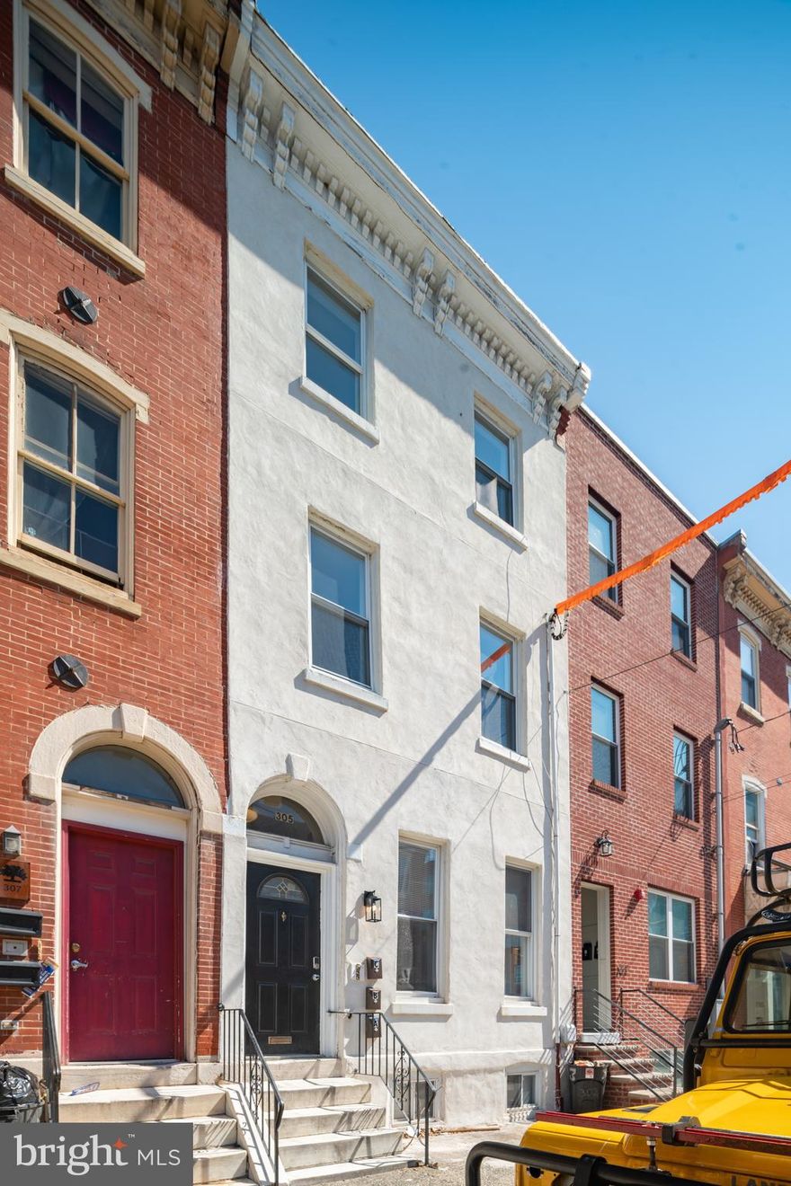Welcome to 305 N 41st Street, a fully leased triplex offering immediate cash flow and exceptional long-term upside in one of Philadelphia’s fastest-growing development corridors. Whether you are an investor seeking a strong addition to your portfolio or a buyer looking to owner-occupy and house hack, this property presents a compelling opportunity in the heart of West Powelton. The building consists of three well-maintained 2-bedroom, 1-bath apartments, each featuring hardwood flooring, in-unit laundry, and recently upgraded kitchens and bathrooms. Kitchens include granite countertops, white cabinetry, and newer appliances, while the bathrooms offer updated fixtures and modern finishes. The property is turn-key and fully leased, providing immediate income from day one. The lower-level unit is the largest, offering private outdoor patio space and direct basement access, ideal for additional storage. All units are accessed through a shared foyer and common hallway, providing convenient yet private entrances for residents. Positioned within a major development and institutional growth area, the property benefits from strong and consistent rental demand. It is walkable to multiple major university campuses, including UPenn and Drexel, and minutes from University City’s hospitals, research centers, and expanding commercial corridors. Located just two blocks from 40th Street Station, the property offers exceptional connectivity via rail, trolley, and bus routes. With a Walk Score of 85 and Transit Score of 99, residents enjoy easy access to Market Street, Lancaster Avenue, Spring Garden Street, Center City, I-76, and I-95. With its prime location, strong tenant demand, and proximity to some of Philadelphia’s largest employers and universities, 305 N 41st Street represents a rare opportunity to secure a fully leased asset in a high-growth neighborhood with significant long-term appreciation potential.