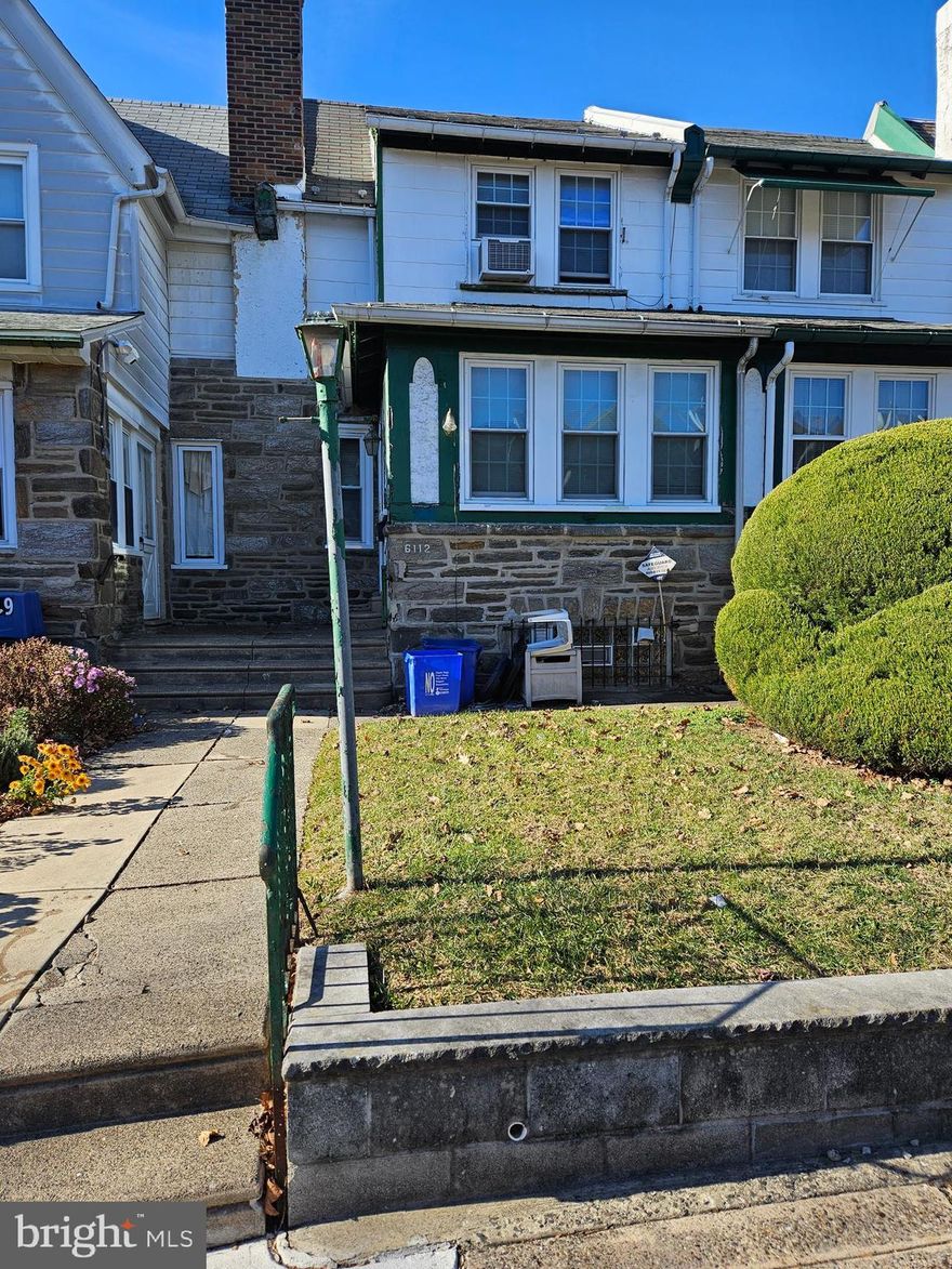 Welcome to 6112 N 6th St, Philadelphia, PA 19120. in the vibrant upcoming Olney neighborhood of Philadelphia.  Located only a few steps away from the historic Fisher Park, this SELLING “AS-IS” Row-home has 3 bedrooms, 2 full bathrooms complete with a very long and large finished basement. The kitchen and bathrooms need repairs and/or updating as well as a few other areas which is the reasoning for such a great deal for a buyer that wants to make this house their custom HOME. However, with these 1940’s older homes, which retains the dedication and timeless charms of high ceiling with crown molding, carpets, and hardwood flooring throughout has a solid stone construction that was built to last.  This home can easily be converted into an open floor plan that’s ideal for both daily living and entertaining.  The property rear shared driveway has ample space for your personal retreat, providing a space for rear parking. The rear of the house is ideal for adding a deck to relax, entertain, or simply enjoy the outdoors. 
Upstairs, you'll find one large sized bedroom, with two smaller bedrooms and the second-floor bathroom. Each of the two smaller bedrooms offer great closet space with for convenient storage. The second-floor full bathroom has a walk-in shower and a separate tub which adds a touch of luxury right off the smaller bedrooms. The front large bedroom has plenty of potential for a possible walk-in closet or a small master bathroom, if done correctly. The finished basement has plenty of space and holds the other full bathroom which is located in the laundry room. The fully finished basement also offers an additional possible 4th bedroom or office or play room area, along with concrete flooring while providing a versatile additional space that can be used for storage or a gym workout area, and more. The property is in an area that has long time residents with shopping and public transportation hubs under a mile and a half away. People with a vision, creativity, and a passion to take something old and make it new and yours, should not pass this by. SELLING “AS-IS”.