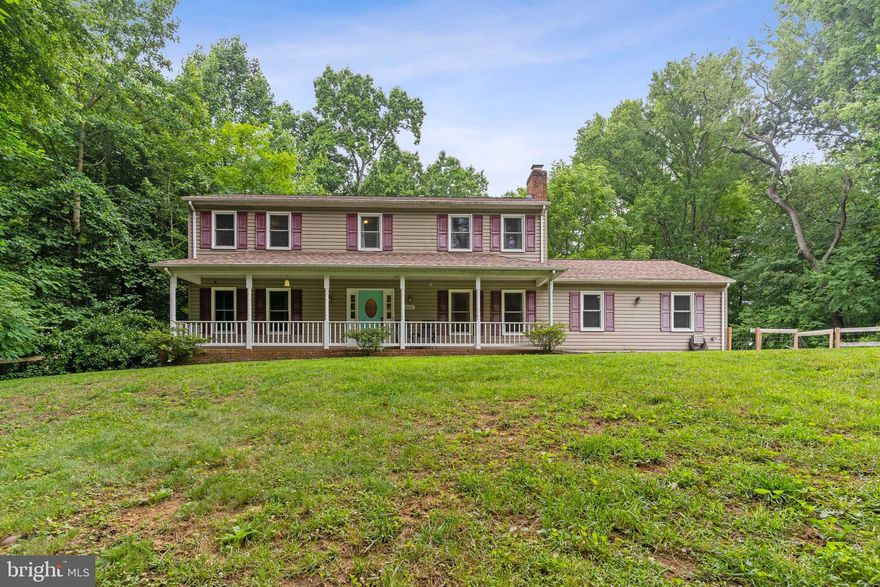 Beautiful colonial surrounded by woods! This home offers lots of privacy while still being within a community. Large front porch, fenced-in yard, rear deck overlooking the back yard & small creek, and above-ground pool. Large family room great for gatherings, fireplace for cozy winter nights, large open concept kitchen with lots of natural light, and a large scenic window looking over your wooded backyard. 4 bedrooms all with large closets! The master bedroom features a large walk-in closet, an updated bathroom with a separate soaking tub, and a walk-in shower. This home features LOTS OF UPGRADES! NEW Windows thru-out, HVAC, Water Heater, Washer, and Dryer! There is a 2-car detached garage located in the rear yard. The home is close to Rt 210 and 301 for an easy commute into DC, Andrews AFB, and Nothern VA.