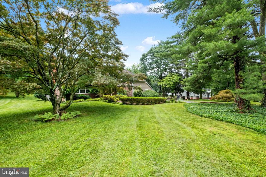 Extraordinary opportunity: classic Main Line colonial on nearly 1-acre, flat lot with mature trees/landscaping.  Set back off Spring Mill Rd, just steps from Philadelphia Country Club.  Attached 2-car garage, finished walk-out lower level.  Award winning Lower Merion schools.