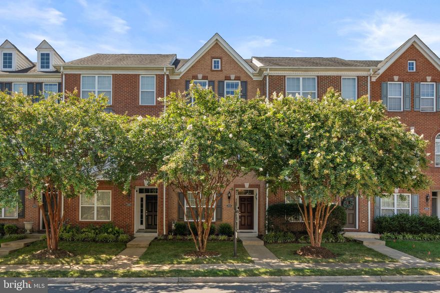 Welcome home to this beautiful Ashburn townhome on a premium lot backing to woods with great Loudoun public schools! This unit has been well-maintained by the owners, and numerous updates and upgrades have been made. The main level features an open floor plan with an abundance of natural light and a spacious gourmet kitchen equipped with stainless steel appliances, a large center island, and ample cabinetry, as well as an eat-in space.  The deck also features a motorized Sunsetter awning to keep you in the shade on those hot summer days, allowing you to enjoy the peaceful setting and privacy of this wood-backed, premium lot.  The kitchen flows seamlessly into a living/dining room area, offering plenty of options for a homebuyer to tailor the space to their needs. The half bath on the main floor was also renovated in 2025. Upstairs there are 3 bedrooms with vaulted ceilings, and 2 full bathrooms, including custom closet built-ins and a double vanity in the primary suite (newly painted in 2023). In addition to the two other bedrooms and full bathroom, there is also upstairs laundry with a new washer in 2024. Downstairs is a fourth true bedroom with its own closet and full bathroom, which is a huge bonus for guest space or a great home office. The garage also has TONS of built-in storage shelves. Upgrades include a new water heater (installed in 2024), a new HVAC system (installed in 2022 with a transferable warranty through March 2027), new carpet 2025 and flooring in kitchen 2021/2022, a motorized Sunsetter deck awning in 2021, and updated light fixtures. The street behind the townhome is a dead-end and a great place for playing with young kids on a quiet street.  Through the Loudoun Valley Estates II HOA, you also will have access to three separate pool complexes (one is a short walk away), fitness center, several playgrounds, and walking trails. Close to the Ashburn Metro (3 miles), major commuting routes, Hal and Bernie Regional Park, wineries, and shopping. Come check this house out for yourself!