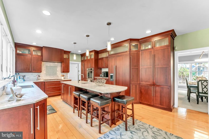 Located in the award-winning Rose Tree Media School District this home sits in one of the premier communities with easy access to major roads and PHL Int. Airport just under 15 minutes away for easy travel. Rose Tree Estates offers quick access to the Media/Wawa Regional Rail and is walkable to the Media Borough which has plenty of shops and delectable dining and entertainment options. If it is outdoor adventures that you seek, the community itself has wonderful walkability and nearby you can enjoy tranquil walks at Ridley Creek State Park and family fun at Tyler Arboretum, Linvilla Orchards and more!  From the moment you pull up to this wonderful executive home, you will appreciate the gracious curb appeal of this traditional, brick colonial.  Situated on one of the largest lots in the community, this property has more than enough room for both a stately front lawn and a wonderful backyard oasis with a stunning paver patio and plenty of flat space for any additional back yard entertaining that you may desire.  Once inside the home, the soaring double height entry foyer, grand staircase, beautiful hardwood floors, gorgeous moldings and a lovely formal living and dining room are sure to impress.  The powder room and full office with practical and stylish built ins and French doors for privacy lead to the main heart of the home which is the two-story, OPEN CONCEPT family room and stunningly renovated and designed chef’s dream kitchen.   The family room has a lovely gas burning fireplace and is open to the sun filled breakfast room and designer kitchen.   When the owners remodeled the kitchen, they designed a complete window wall for maximum natural light and great views of the backyard, and they included an oversized eat around, quartzite island which is the heart of the kitchen.  A stunning glass and marble backsplash, custom hood, cabinet finished appliances including a Thermador refrigerator add to the one-of-a-kind kitchen in this home.   Beyond the kitchen is another unique custom remodeled space; a true working mudroom and laundry space that are designed to serve today’s family needs with built in cubby’s, cabinets, sitting bench, shoe shelves, counter space and more.  The wonderful entertaining and living space continues in the finished basement which has a second kitchen, a full bathroom and several living spaces one of which is anchored by a slate surround, gas fireplace.  On the upper level, there are three generously sized bedrooms, a full hall bathroom and a stately primary suite which includes THREE WALK-IN CLOSETS and an oversized main bedroom that has room for a full-size sitting room IN THE BEDROOM as well as a secondary finished space with lovely built ins that can be used as a den, nursery or secondary office space.   The newly remodeled master bathroom with elegant finishes and modern fixtures is a stunning feature of this primary suite.  If you have been seeking just the right home in one of the best school districts in the state with good proximity to Philadelphia and Wilmington, this is it!   Come take a tour of the property and you will surely want to call this your home.