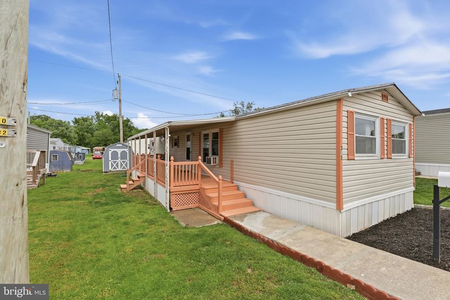 This adorable home in Winterset Farms Manufactured Home Community has lovely curb appeal and is just as nice inside! An oversized, covered deck greets you as you enter this home in the "land of simple living".  Nice floor plan as there is a spacious living room, nice size kitchen with plenty of cabinets, and a front bedroom with plenty of windows for extra light (and privately located away from the largest bedroom which is located in the back of the home). The full bath is lovely and there is also a laundry area adjacent to the bathroom (washer and dryer are included) with a door to the side yard. Heater and water heater both replaced in 2019, and home also comes with a one year American Home Shield Home Warranty. Cute home at a super competitive price! Come see!
(Manufactured home loans are acceptable but homes not eligible for a mortgage since it is a lot lease and you do not own the land.)