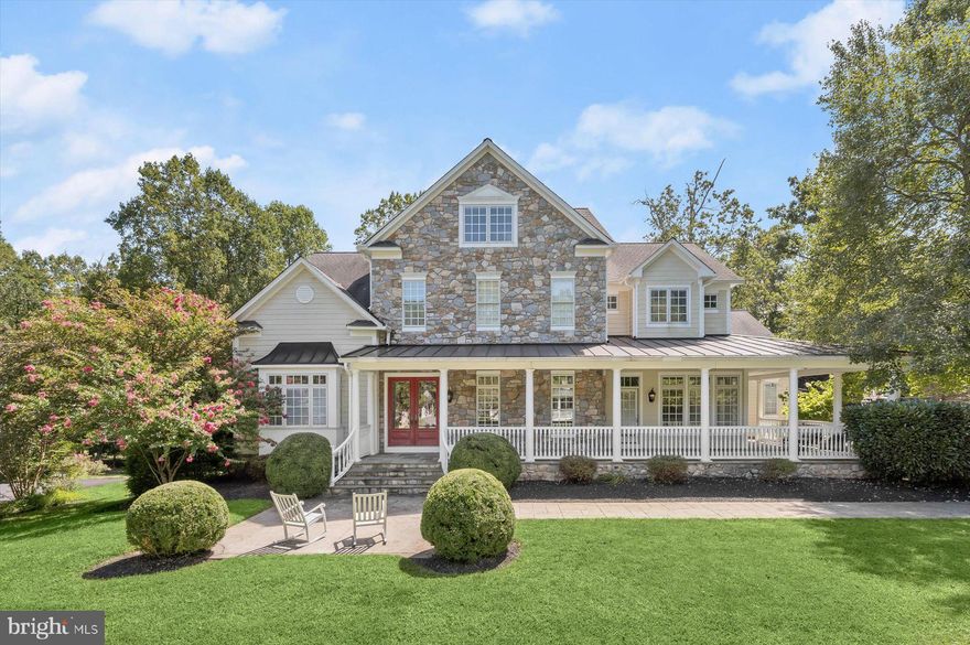 Inspired by a Southern Living plan, and custom built with quality upgrades and amenities by Selfridge Builders, this stunning property is perfectly situated on a premium wooded lot and cul-de-sac in the desirable Wellington community, 
  
Endless lifestyle options await offering over 8,000 square feet, four levels, eight bedrooms, six full baths, and two half baths. Multiple outdoor living spaces include  front and side porches with primary and secondary entries, covered rear TREX deck, cascading stone stair, rear patio, and walk-out lower-level covered patio.

Inside, the floor plan invites comfortable gatherings large and small.  Every inch of this masterful design is executed with superior quality materials and fine craftsmanship.   This home is not only beautiful, but also built to last with low maintenance, quality building and materials even in places you cannot see such as an upgraded I-joist system, Tyvec house wrapping, Screw and glue 1” plywood subfloor, a whole house generator, and a 380 Ft deep -well with 4.25 gallons per minute.

Beauty and quality are paired up at every turn. Enjoy upgraded base and crown moldings, extra width for gracious stairs, increased thickness for stronger railings, and low maintenance features such as continuous wainscoting to protect walls in stairs and halls.
Interior high-performance features also include Pella windows and doors with integral blinds, solid core interior doors, and California Closet organizers in every closet.

You will find countless amenities customized for convenience and efficiency. A few of the homeowners’ favorites include the kitchen wrap-around center island with a farm sink and a secondary prep sink for meal preparation. The oversized mudroom is sided by a long wall of lockers, (all-time favorite), a walk-in service closet, paper/homework closet and powder bath.

Calling all lifestyles!  Work at home, studio artists, au-pairs, students, guests, in-laws, children and grandchildren… come home to luxury, quality and infinite lifestyle options, with every imaginable amenity!