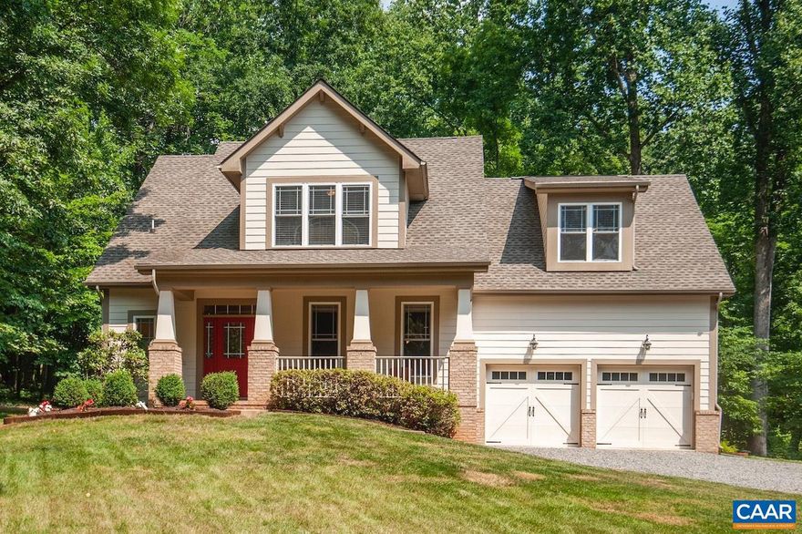 Craftsman privately situated on a large parcel with seasonal mountain views and a wet-weather stream! Ideal location to walk to Lake Monocan or to just enjoy the wonderful outdoor space from the deck, covered front porch, and screened back porch; even has the perfect place for pets or play with a spacious fenced backyard. Well constructed with optimal flow and many recent improvements or extras: HardiePlank siding, 50 year shingle, insulated tilt-sash windows, tankless water heater, gas fireplace, open floor plan with vaulted and tray ceilings, beautiful and functional kitchen (pantry, breakfast nook, island, instant hot water, and all new appliances), walk-in closets in all bedrooms, bonus room, 2 car garage, encapsulated crawlspace, 20KW Cummins whole house generator, and fiber internet with Firefly already routed to the home.  Live on one level with 1st floor master with deck access and a newly renovated bathroom with heated floors, tile shower, and a soaking tub. Reserve upstairs for guest, home office, or recreation with a large bonus room. Only 30 minutes to Charlottesville.,Glass Front Cabinets,Granite Counter,White Cabinets,Fireplace in Great Room