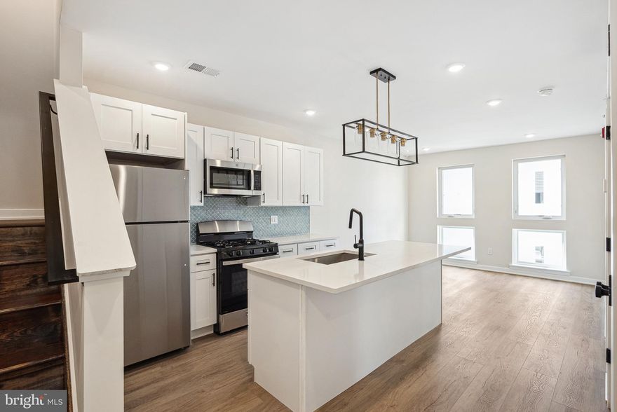 Welcome to 138 Tasker St, a brand-new construction building offering modern living at its finest. This beautifully designed unit features a spacious layout, hardwood floors, and high-end stainless steel appliances—including an in-unit washer/dryer, dishwasher, garbage disposal, microwave, and oven/stove. Enjoy sleek, contemporary bathrooms, and large windows throughout the unit that bring in abundant natural light, creating a warm and inviting atmosphere.  Private access to your own roof deck offers stunning views of the city, and plenty of space to enjoy warm summer nights. You are just steps from Dickinson Square Park and the Delaware River Waterfront, as well as tons of vibrant cafes and restaurants. Parking is available for just $150/month, a convenient price with I-95 just a few minutes drive away. Pets are welcome—cats with a one-time $350 non-refundable fee, and dogs with a $500 non-refundable fee (size and breed restrictions apply). Don’t miss the opportunity to live in one of Philly’s most desirable neighborhoods!