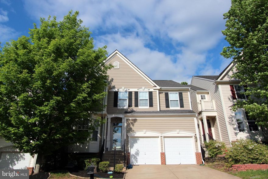 S.F. Home In the Heart of Lorton Station. 4 bedrooms, 3.5 baths. Open floor plan, Spacious Room Sizes. Granite Kitchen, Main Level Hardwood, Fully finished basement with 25' X 15' Rec. Room, Den & Full Bath. All in All this Home has around 4,400 Sq. feet of living space. Private yard w/ deck. Walk to Virginia Railway Express, Restaurants/Shops. Close to Ft. Belvoir, NGA. Talk about Location!