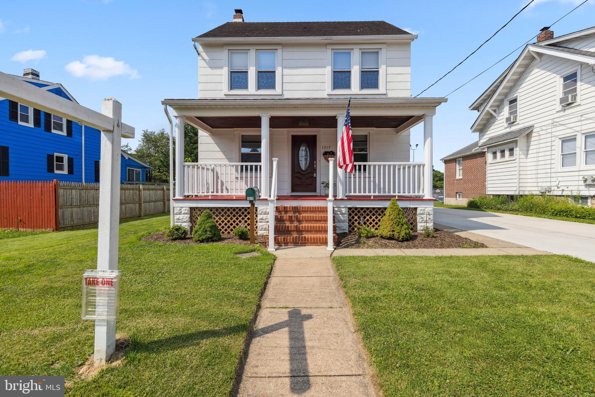 Welcome to 1317 Birch Avenue, a beautifully maintained 3-bedroom Colonial tucked into the quiet Linden Heights community of Halethorpe. From the moment you arrive, the covered front porch and lush landscaping set a warm and welcoming tone—this is the kind of place that already feels like home. Step inside to find hardwood floors and natural light filling the living room, where a decorative fireplace and mantel add charm and character. A ceiling fan keeps things comfortable, and an arched doorway draws you into the formal dining room—perfect for dinners, game nights, or casual gatherings. A breakfast bar pass-through connects the dining room to the kitchen, making the whole space feel open and connected. The kitchen blends everyday function with a touch of farmhouse style—complete with stainless steel appliances, gas cooking, a deep apron sink, ceiling fan, and durable laminated flooring. Just off the kitchen, an enclosed sunroom with screened glass windows and soft carpeting offers a cozy, flexible space to relax, work, or entertain for most of the year. Upstairs, all three bedrooms offer hardwood floors and decorative molding. The third bedroom includes access to a full, walk-up attic with a rough-in for an additional bathroom—ideal for future expansion, storage, or creating a private retreat. The full bath is tastefully updated with a quartz vanity top, tub/shower combo, and easy-care flooring. The unfinished basement provides plenty of room for storage or a workshop. Outside, you’ll find a detached garage that also works well as a shed, plus a long concrete driveway with parking for three. And for those with a green thumb, the yard has been lovingly maintained by a passionate gardener—offering rich soil and great potential for your next planting season. Just minutes from the UMBC campus and neighborhood walking loop, this home offers a thoughtful blend of charm, comfort, and convenience. Come see it for yourself—you’ll feel the connection the moment you walk through the door.