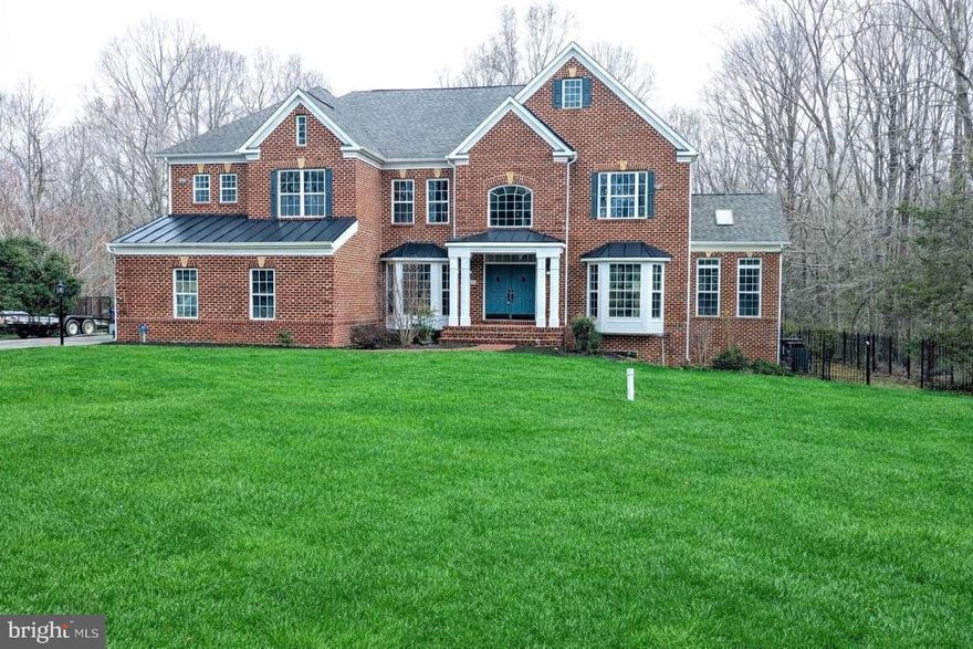 OVER 7,700 square feet!. Why buy new when you can buy a beautifully renovated estate home NOW. Welcome to a truly exceptional living experience, a 6-bedroom, 6 full and 2 half bath. This exquisite home seamlessly blends modern sophistication with timeless charm, offering an unparalleled standard of living on over a 3 ACRE lot. Step into the grand foyer, where soaring ceilings create an ambiance of opulence. A flowing floor plan guides you through sun-kissed living spaces adorned with the finest materials and meticulous craftsmanship. The spacious main level, adorned with large windows, invites natural light to dance across the brand new wood flooring. The gourmet kitchen is a chef's delight, boasting top-of-the-line commercial grade appliances - Thermador and GE/Cafe stainless steel, sleek quartz counter-tops, and a spacious island that beckons for culinary creations and lively gatherings. Adjacent, the formal dining room exudes an air of elegance, perfect for hosting unforgettable dinner parties. Retreat to the lavish primary suite, a sanctuary of tranquility featuring a private sitting area, a spa-inspired en-suite bathroom with a deep soaking tub, and a walk-in closet. Each of the additional 4 bedrooms have their own private full bathrooms, offering ample space, adorned with modern fixtures and luxurious finishes. This luxury home is not just a place to live; it's an embodiment of prestige and refinement.