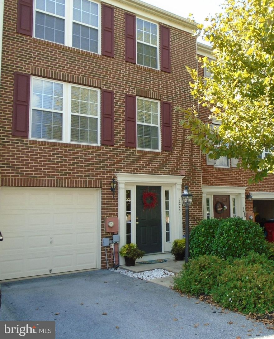 Spacious and immaculate 3 bedroom, 2 1/2 bath town home in Fairfax Crossing w/ 3 finished levels. Large kitchen w/ island combines w/ the family room and leads to the rear deck. Separate living room for entertaining and a finished rec room leads to the rear patio and fenced, beautifully landscaped backyard. A 1 car garage and brick front complete this amazing package!