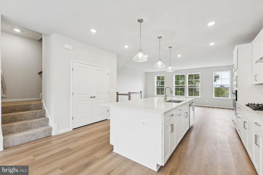 Gorgeous view from all four levels of this beautiful townhome.  Immediate delivery.  This house is larger than many single family houses.  Upgrades galore!  Gourmet kitchen.  Huge center island.  Secondary bedrooms can accommodate queen size bedroom sets. (PHOTOS OF SIMILAR HOME)