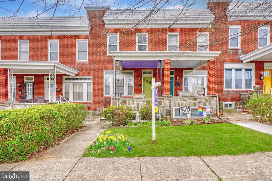 Welcome to 2715 Chesterfield Avenue, a lovely porch townhome that will steal your heart! Once called "Doctor's Row,"  the homes on Chesterfield face beautiful Herring Run Park and are just a few blocks to gorgeous Lake Montebello. Thoughtfully updated, you'll find a perfect blend of modern amenities and the vintage charm and character of this circa 1928 home. Some of the updates include: replacement of water lines with pvc (2018), new roof (2018), new basement flooring (2018), new garage roof (2019), new mini-splits in kitchen, front and back bedrooms (2019) and many more! You won't find any soulless luxury vinyl tile  here. The original wood floors have been preserved and have a lovely, aged patina. The living room has both the original art deco decorative fireplace and french doors. There is a large, separate dining room  as well as an updated kitchen and summer kitchen! The second floor has tons of natural light and three spacious bedrooms as well as a terrific full bathroom with classic 1920s black and white tile. The basement is a perfect retreat. Use it as an in-law suite, a media room or a home office and 4th bedroom. There is also another full bathroom as well as a handy kitchenette, please note the stove in not currently connected. Last but certainly not least, is the sweet backyard which is ready for your summertime raised beds and a one car garage. Don't miss this absolutely delightful home. These parkfront homes with gorgeous views of expansive green space don't come along very often!