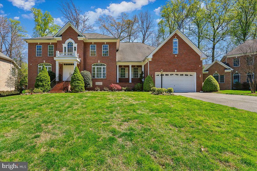 Stunning 2002 colonial w/amazing floorplan, sun-filled rooms & high ceilings!   The entire home has been completed painted inside and out, plus new carpet.  The main level encompasses  a 2-story Foyer entry, formal Living Room, formal Dining Room, a huge Family Room w/gas fireplace, a main level Library (or could be 5th Bedroom), a full bath, gourmet Kitchen w/island, Breakfast Room (w/french doors to the backyard terrace/backyard, (2) pantry closets, separate Laundry Room and another small room for a future Half Bath (plumbed for powder room).    Upstairs has 3 large sized bedrooms with ensuite full baths and a knockout Primary Bedroom Suite with a 3-sided gas fireplace, a separate sitting room, multiple and oversized walk-in closets and a Primary Bath with separate tub and shower, plus multiple vanities/sinks.  The almost 2,400 sq ft basement is ready to be finished and has lots of windows and french doors that exit to the stairs up to the backyard.  2-car garage and a long driveway that can accommodate many cars.   This spectacular price reflects it's location and very quiet inside the home!  Don't miss out on this fantastic, exquisite home!!