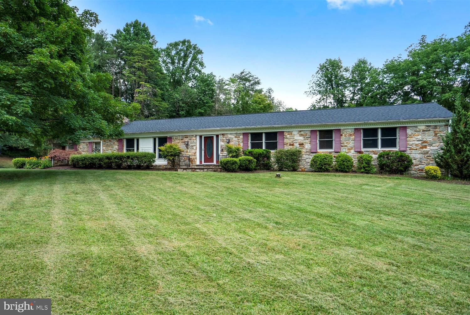 Over 5,000 square feet of luxurious living space! This warm and rare rancher is built for entertaining and entertainment, steps from the Loch Raven Reservoir in the coveted Phoenix school district. Winding roads and steel bridges take you away from it all, while quick and easy access to 83 and Baltimore brings convenience. Beautifully updated with an outdoor oasis nestled on two, private and picturesque acres. Bathed in natural sunlight, featuring a spacious gourmet kitchen that overlooks the living/family room s breathtaking fieldstone/bluestone wood-burning fireplace. Gleaming bamboo and tile floors lead to another cozy family room with a second wood-burning fireplace, over-sized master suite with walk-in closet and jetted tub, three additional bedrooms and two and a half marble baths. The downstairs is newly remodeled with a projection theatre, gym, large play areas for the children, a music room and two bright bedrooms, each with full egress windows and individual temperature units. A full bath and ample storage/work room round out this epic family space with something for everyone to enjoy. Spacious two-car garage with extra room for storage. Step outside and enjoy the large, private yard surrounded by trees, an acre fenced-in, custom stone patio with fire pit, gazebo and large, mature trees. Make an appointment today!