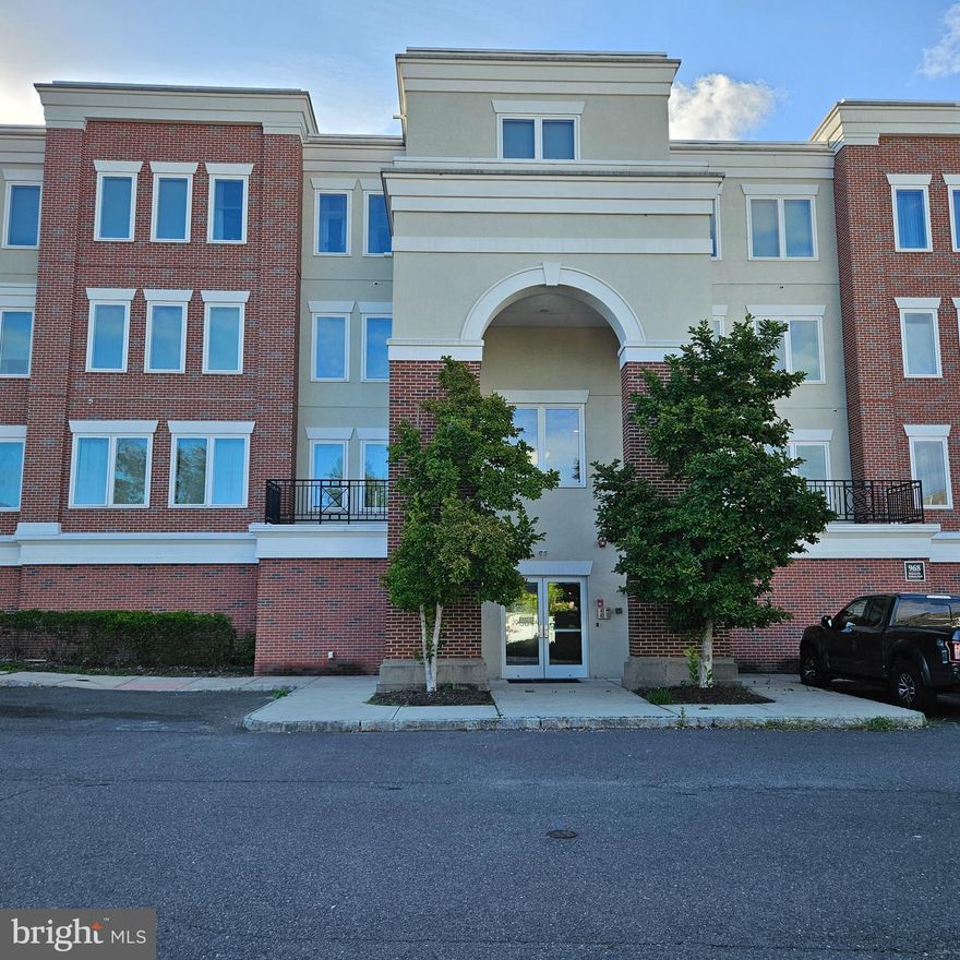 Reduced Price!  This 2 bedroom 2 full bathroom in The Lofts in Robbinsville is now available.  The unit has beautiful hardwood floors and oversized windows which let in tons of natural light.  The kitchen has upgraded countertops and stainless steel appliances.  The laundry room is across from the kitchen and has newer washer and dryer.  This room also has ample storage space.  The unit opens to a dining area and large living room.  The primary bedroom is oversized and features a huge bathroom with walk in shower and two pedestal sinks.  This room also has a walk in closet as well as a large closet.  The second bedroom has ample space and features a large closet as well.  The second bathroom is also spacious.   There is an extra storage area in the building as well as underground parking.  Located in desirable Robbinsville, this unit is close to shopping and all major transportation and boasts a highly rated school district.
It is ready and waiting for you.  Come see it today.