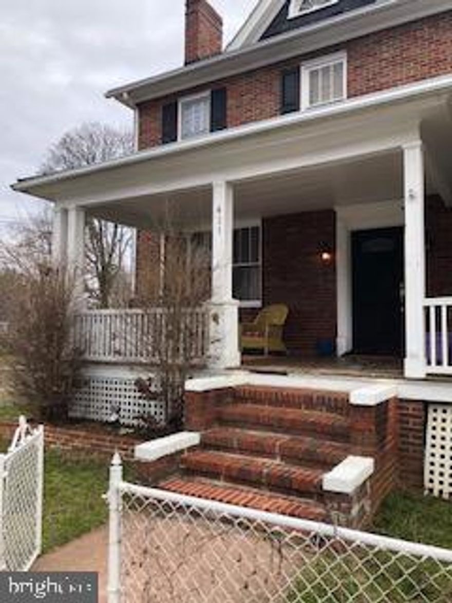 Spacious rooms, many windows to open the blinds and  let in the light.  Large friendly front porch.  Kitchen recently updated w/ granite counter tops, new cabinets, ss appliances.  New ceramic floors in kitchen, back room.  Heating and AC just 3 years new.  There are many possible uses for the back room.; breakfast area, office, TV rm, mud rm. Street parking  or park in the back via the alley.  Shed in back yard.  Hardwood floors, original stained trim and windows. Bright basement..   A lot of house for the money !