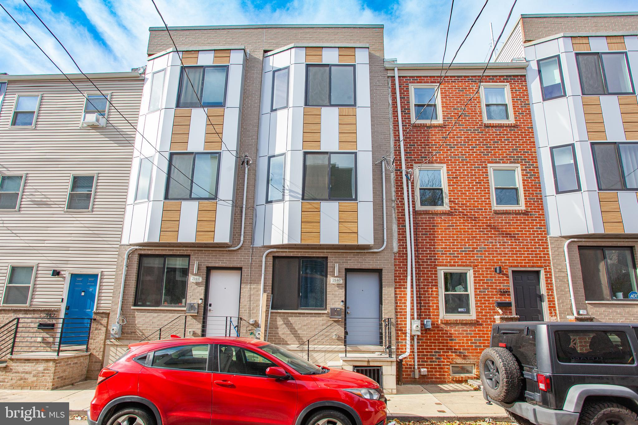 Welcome to 2146 N Fairhill St Unit #1, a fully renovated home in the Norris Square Temple University neighborhood! This inviting space features an open living room and kitchen with hardwood floors, stainless steel appliances, white cabinetry, and marble countertops with an island. The lower level offers a cozy bedroom, full bath with tiled tub and shower, and a convenient washer and dryer. Enjoy a private patio perfect for grilling and entertaining. Don't miss this incredible rental opportunity!