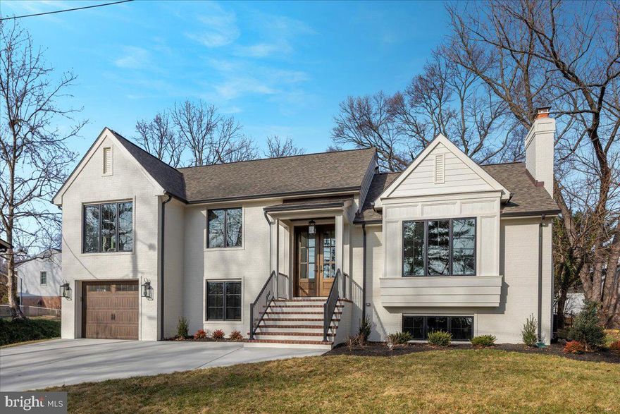 NEW, NEW, NEW!!!! A must-see! This completely renovated home was built by highly regarded custom home builder, Joseph Mohr Construction, Inc., known for the QUALITY of his homes. 

Located on a quiet cul-de-sac in the sought-after Glencarlyn neighborhood, this split-level home offers beautiful, highly efficient, modern living with timeless charm. Expanded to approximately 2,800 square feet, the home features 4 spacious bedrooms, 3.5 luxury baths, and an office that can easily function as a 5th bedroom.

The exterior of the home consists of 80% painted brick and 20% LP Clapboard Smart Siding, a brand new 30 year Tamko Titan Architectural roof, all new black, Pella Casement windows, and a gorgeous, 8 ft, mahogany double front door. 

The redesigned floor plan flows seamlessly from the main entrance into an open and airy living space. The open-concept kitchen and family room are perfect for entertaining, showcasing a modern French country design with quartz countertops, upgraded custom cabinetry, and high end appliances, including a matte black GE Café commercial-style gas range and a GE Café fridge with a built-in Keurig brewing system. The white oak hardwood flooring, custom decorative wood beams in the vaulted ceiling, and the brick fireplace, with gas logs, in the family room create a warm and welcoming atmosphere on the main floor. The large screened-in, covered back porch is a perfect extension of the kitchen and will surely become the favorite room in the house!

The renovation also includes a one-car garage and a luxurious primary suite with vaulted ceilings, extensive trim details, and a spa-like luxury bathroom featuring a soaking tub, a custom zellige-style tile shower, and a spacious walk-in closet with built-in shelving. The garage entrance includes custom locker spaces for organization and a beautiful laundry room that includes a farm sink, folding table with quartz countertops, and custom cabinetry with ample storage and hanging space.  

This floor leads to the basement rec room, which showcases another brick fireplace with gas logs and a large wine and beverage center. Outdoor spaces include a screened-in porch with vinyl composite decking and a backyard with a brick paver patio, perfect for relaxing and hosting gatherings.

The home is ideally situated in a family-friendly neighborhood with its own public library just a few steps away and within walking distance of Long Branch Nature Center, Carlin Springs Elementary School, and Kenmore Middle School. Nearby Carlin Springs Road provides quick access to the Rosslyn-Ballston corridor, Columbia Pike, the Pentagon, National Airport, Crystal City, and Amazon HQ2. For added convenience, Rt. 50/Arlington Blvd. offers a direct route to Washington, Fort Myer, and other key locations.