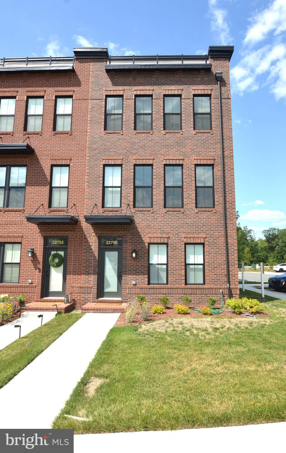 PLEASE REMOVE SHOES WHEN SHOWING PROPERTY*6 MONTH SHORT TERM AVAILABLE AT $5,400 A MONTH TO INCLUDE PAID ONCE A MONTH CLEANING SERVICE*IMMACULATE EXECUTIVE FULLY FURNISHED END UNIT BRICK FRONT TOWNHOUSE WITH UNIQUE ROOFTOP TERRACE & CLOSE TO $40,000 OF CUSTOM FURNISHINGS*OVER 2,700 FINISHED SQUARE FEET OF LUXURY LIVING IN THIS 5 BEDROOM, 3 FULL BATH & 2 HALF BATH TOWNHOUSE WITH REAR 2 CAR GARAGE & PLENTY OF GUEST PARKING THROUGHOUT*OPEN, LIGHT & BRIGHT THROUGHOUT*SHOWS IMMACULATE FROM TOP TO BOTTOM*COVERED FRONT BRICK STOOP*WIDE PLANK LVP FLOORING & 9 FOOT CEILINGS & WOOD STAIRS WITH CUSTOM RAILINGS THROUGHOUT*MAIN LEVEL DOUBLE FRECH DOORS LEAD TO VERSATILE BEDROOM/OFFICE OR DEN WITH HALF BATH*UPPER LEVEL WITH TONS OF WINDOWS FOR NATURAL SUNLIGHT*OPEN LIVING ROOM WITH RECESSED LIGHTS*DINING ROOM WITH CUSTOM CHADELIER*GORGEOUS GOURMET KITCHEN WITH HUGE CENTER ISLAND, QUARTZ COUNTERTOPS, ALL STAINLESS STEEL APPLIANCES, 42 INCH CABINETS & CERAMIC TILE BACKSPLASH*DOUBLE DOOR PANTRY CLOSET & BREAKFAST BAR OVERHANG*HALF BATH WITH PEDESTAL SINK*WALK OUT REAR MAINTENANCE FREE DECK*LARGE PRIMARY BEDROOM WITH WALK IN CLOSET*LUXURY PRIMARY BATH WITH OVERSIZED CERAMIC TILE FLOORS & QUARTZ COUNTERTOPS*2 ADDITIONAL BEDROOMS & FULL BATH WITH OVERSIZED CERAMIC TILE FLOORS & QUARTS COUNTERTOPS*CONVENIENT WASHER & DRYER ON THIS LEVEL*TOP LEVEL FEATURES HUGE LOFT, 5TH BEDROOM WITH WALK IN CLOSET & FULL BATH WITH OVERSIZED CERAMIC TILE FLORS & QUARTZ COUNTERTOPS*WALK OUT TO UNIQUE ROOFTOP TERRACE FOR ENTERTAINING*ENJOY ALL OF BRAMBLETON'S AMENITIES WITH WALKING TRAILS & PONDS*WALK TO BRAMBLETON SHOPPING CENTER TO ENJOY WEEKEND FUN WITH MOVIE THEATRE, SHOPPING, RETAIL, GROCERY STORES & RESTAURANTS*