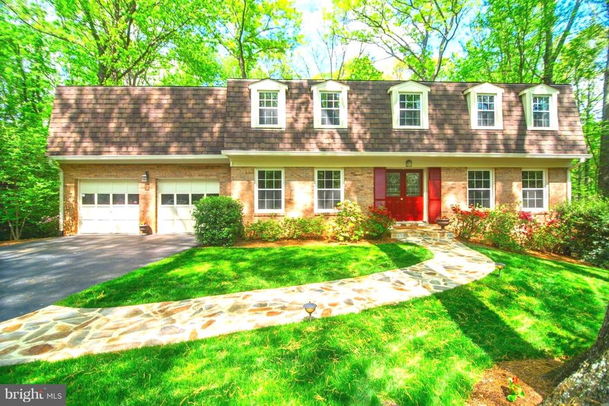 Spacious 5 bedroom home on over a 1/2 acre wooded lot. Every room has been updated, incl: custom screen porch w/ vaulted tongue & groove cedar ceiling overlooking serene yard backing to parkland that can't be developed & walking paths WOW! White kitchen cabs, granite, 5 large bedrooms, finished walk/out to stone patio. Newer HVAC, roof, too many upgrades to list! See HomeJab video tour. OPEN SUN