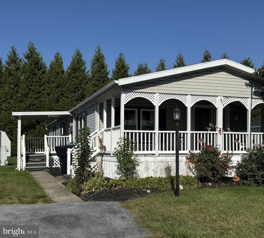 This approximately 1,200 square foot house features 3 bedrooms and two bathrooms in a desirable 55+ community and is ready for you to make it your own.  The floor plan is an open concept between the kitchen, living room and dining room with a nice deck off of the front of the home.  There is another porch on the side entrance of the home that is covered.  A shed on the property provides additional storage.  Property is an estate and being sold AS-IS