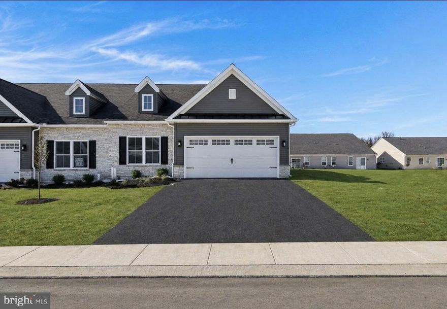 Last lot available in this phase—don’t miss out! Enjoy easy, low-maintenance living in this brand-new construction home designed for convenience and comfort. Perfect for a lock-and-leave lifestyle—travel this summer without worrying about yard work! This home features 2 bedrooms and 2 full bathrooms, including a spacious main-floor primary suite with cathedral ceilings, a walk-in closet, and a private bath. The open layout is enhanced with included upgrades such as LVP flooring throughout the main living areas and bathrooms, granite countertops, a 7-foot island, upgraded cabinetry and vanities, and 9-foot ceilings—all included in the base price. Enjoy a smooth, streamlined building process with an end loan, plus the ability to customize your kitchen, baths, and flooring to match your style. Tour the model home today—this is your last chance to build in this phase!