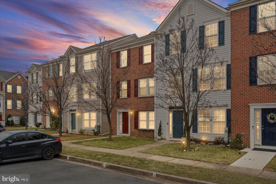 Move-in ready 4BR/3.5BA luxury townhome in the desirable Eaton Square community of White Marsh, backing to peaceful, wooded open space. Park just steps from the front door and enjoy three levels of bright, thoughtfully designed living space with fresh paint, recessed lighting, luxury flooring, and carpet throughout.

The lower level offers a private bedroom with walk-in closet, full bath with walk-in shower, spacious family room, laundry, and access to a covered patio and fenced yard. The main level features an open-concept layout with a large living room, dining area, half bath, and a well-appointed kitchen with granite countertops, tiled backsplash, stainless steel appliances, pantry, and island seating. Step outside to a large wood deck overlooking green space and raised garden beds.

The upper level includes two generous secondary bedrooms, a  full bath, and a primary suite with two walk-in closets and a  ensuite bath. Ideally located near shopping, dining, and major commuter routes, this home offers privacy, space, and convenience all in one.