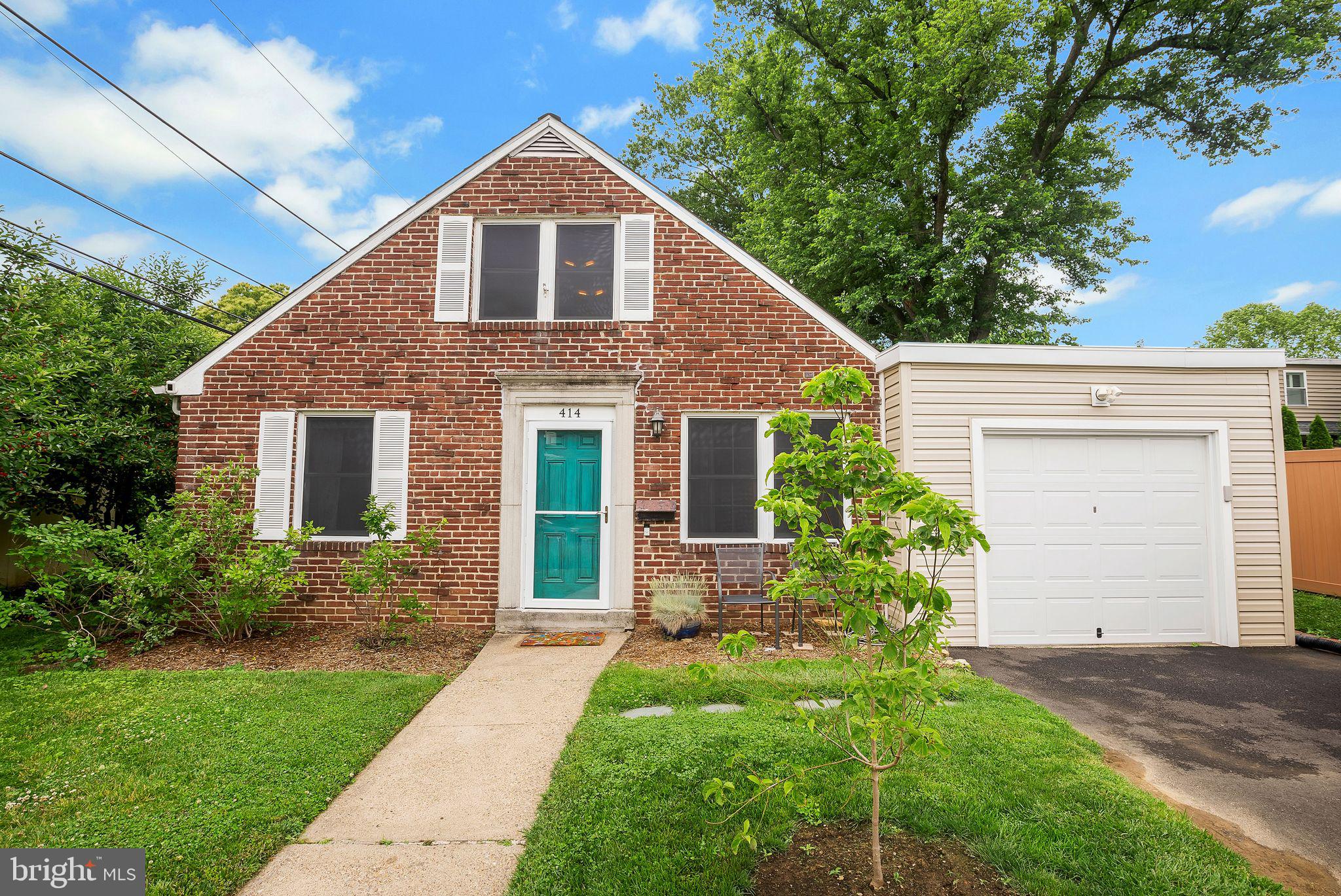 Welcome to this beautifully renovated brick home nestled in the heart of Glenside. From the moment you arrive, the inviting curb appeal and charming front entrance set the tone for what awaits inside. Step through the front door into a spacious and light-filled living room featuring gleaming hardwood floors that flow throughout most of the home, creating a warm and cohesive living space. Just beyond the living room is the dining area, ideal for everyday meals and intimate gatherings. The kitchen is a true showstopper, thoughtfully updated with leathered granite countertops, a stylish volcanic glazed subway tile backsplash, Shaw Floorte Pro Paragon tile flooring, and stainless-steel appliances. The abundant cabinetry offers impressive storage and functionality, making it a joy to cook and entertain. Adjoining the kitchen is sun filled family room, perfect for relaxing or informal entertaining, with sliding glass doors that open onto a large deck overlooking the beautifully landscaped backyard. The main level also includes a primary suite with a double closet for ample storage. The fully renovated hall bath is finished with tile flooring and a tasteful tile tub surround. A generously sized laundry room, which was formerly a bedroom, adds extra flexibility and could easily serve as a combined laundry and home office space. Upstairs, you will find two additional bedrooms and a convenient powder room. The larger bedroom offers excellent closet space and extra storage tucked under the eaves. The second bedroom also includes under-eave storage, making the most of every inch of space. A partial basement houses the HVAC system and tankless water heater
and provides additional storage options. The attached one-car garage adds further convenience. Step outside and discover a gardener's paradise. The nearly fully fenced backyard is brimming with mature plantings, including apple, nectarine, plum, peach, dogwood, and magnolia trees, as well as 5 raised garden beds for those who enjoy homegrown fruits and vegetables. It is a peaceful, private outdoor retreat with plenty of space to enjoy nature or entertain guests. Location, location, location! Just a short walk to Keswick Village’s charming shops and restaurants, train station, parks, schools, and more. All this, plus the award-winning Copper Beech Elementary School—this is one you don’t want to miss!