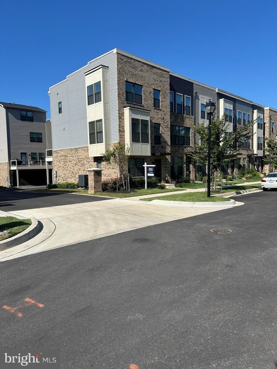 End of Group Townhouse with a Bump Out in Living Room & 3rd Bedroom, Custom Window Blinds Throughout, Window Tinting on Doors & Windows, Mozart Urban 3 Story Model, 9 Foot Ceilings, Sprinkler System,  Panel Doors, Washer & Dryer on Bedroom Level, 2 Car Attached Garage with Opener. Seller Splits the Transfer Taxes.