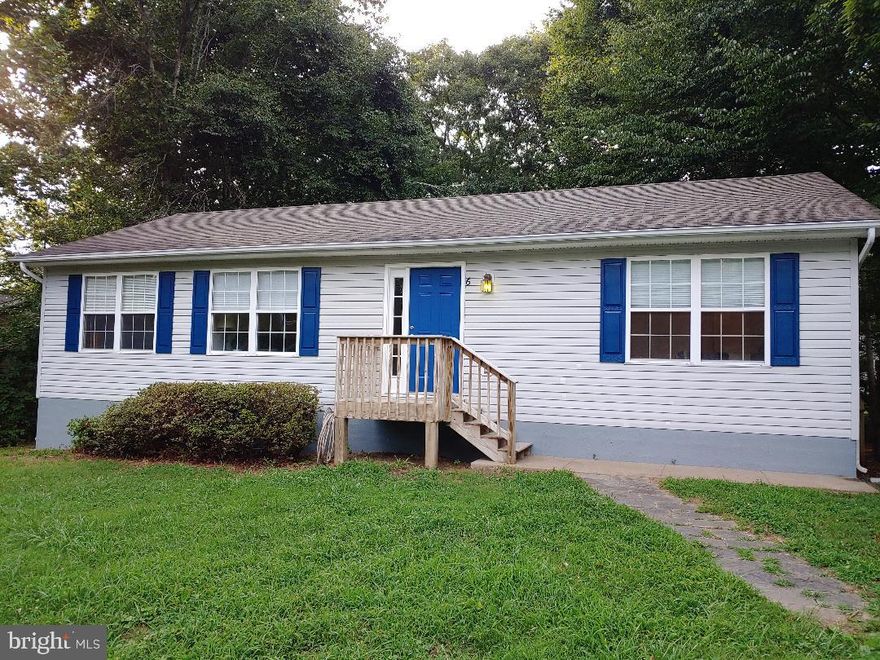 Move in condition, rear yard partially fenced with some tree's for privacy.  Freshly painted. Large screened in porch is an added touch to this home! NO HOA! Private Lake Arrowhead beach.  Walk to the pier to fish. 7-11 close by, Sams sub shop, Ruby Post Office and only 8 minutes to grocery shopping. Come own your piece of the country in a private community.