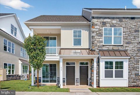 Photo of 425 Isabelle Court #101, HARLEYSVILLE, PA 19438 (MLS # PAMC2177306)