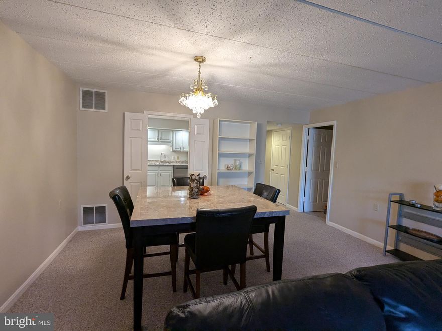It doesn't get any nicer than this 3 Bdrm 2 Bath condominium!    This very well maintained, spacious water view condo comes fully furnished  "move -in ready"!  Come home to tranquility. Enjoy a serene water view from the comfort of your living room or balcony. Shows beautifully with new luxury vinyl plank flooring in the kitchen, laundry room and foyer. Freshly Painted kitchen cabinets with brush nickel handles, newly upgraded granite counter tops, stainless steel stove, microwave and dishwasher, and a new hot water heater.  The building's front entry door has code entry and automatically locks when you enter. Elevator access, Washer and Dryer located in the condo. Additional storage just outside of the condo in the building.  Great for college professionals or students! Looking for convenient and affordable living? Less than 1 Mile to Salisbury University and approx. 30 min from University of MD Eastern Shore.  Canal Woods III is in the heart of Salisbury with plenty of shopping and dining. Buyers and their agent must verify all fees, taxes schools, square footage etc.