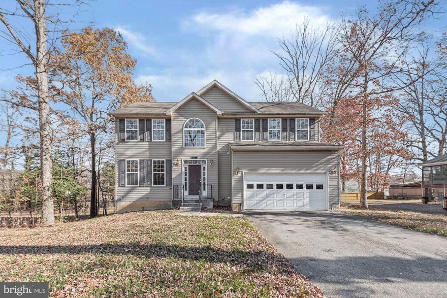 Some photos have been Virtually Renovated to provide a visualization of the property potential after repairs are completed. This one will not last! If you are looking for an affordable home with personal touches to do, then this is it! As you enter, you will find the layout is inviting and convenient - the living room leads you into the separate spacious dining room. From there, go to the equally spacious kitchen which features a kitchen island, lots of storage and a table space. There is a family area with fireplace off the kitchen perfect for entertainment. The half bath on the main level is also perfect for your guests. Kitchen door will lead you the super large deck. The second level features the master suite with a very large bath & walk-in closet. There are three other ample bedrooms which offers closet space and lots of natural lighting. If you need additional space, the basement is ready for your personal touches. You can use as storage, your business space or turn into whatever you need. Definitely a house you want to see.Schedule your tour soon before this one is gone.