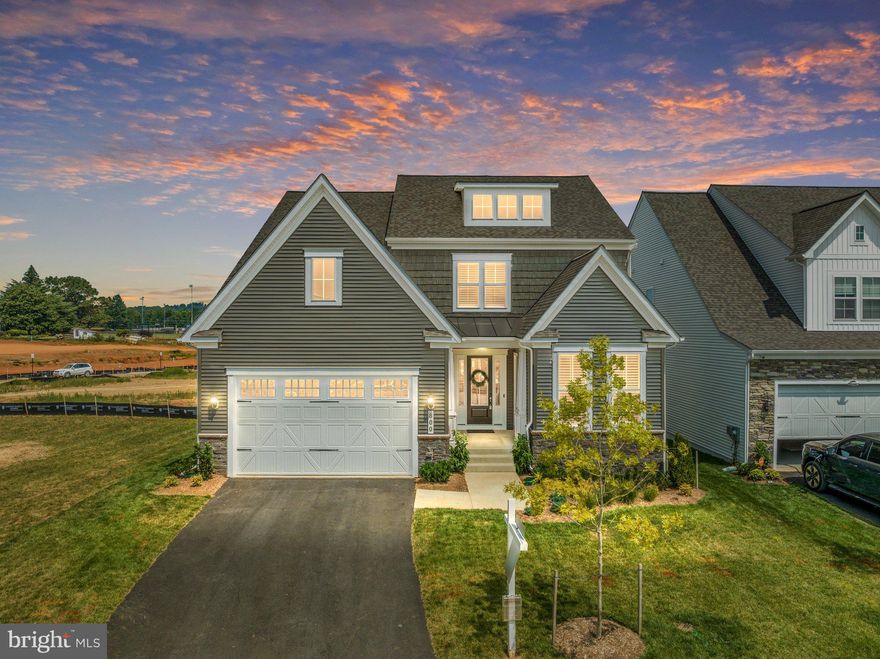 Step into the highly sought-after Jocelyn model at White Oaks Farm, designed with both comfort and style in mind. The main home's open layout seamlessly connects the living, dining, and kitchen areas, creating a perfect space for entertaining. Upgraded plantation shutters throughout the home add a touch of sophistication and privacy. Start your day with  coffee or meditation in the morning room before making breakfast in the state of the art kitchen with Cafe Select Connect appliances. Upstairs, you will find the primary suite with two large walk in closets and  high end bathroom, 2 extra bedrooms with a shared bath, laundry room with cabinets and utility sink,  and a flex loft space perfect for studying, gaming, or reading!  Catch a movie in the basement, which holds room to expand if you'd like to finish the bedroom and the full bath available.

The attached additional dwelling unit is a true gem, offering a private oasis for extended family or potential rental income. This spacious suite includes a kitchenette with refrigerator, dishwasher, stacked washer/dryer, a generous living room, and a lovely bedroom with full bathroom.  Whether you choose to use it as an in-law suite or capitalize on the rental market, this versatile space provides endless possibilities.

Relax and unwind on the 190 sq ft Trex deck, ideal for enjoying the serene outdoor setting and hosting summer barbecues. The fenced backyard provides that extra bit of security. Speaking of serene, this home is at the end of the street, meaning only one neighbor to the side! The left side of the home is reserved community green space.

Located in the welcoming White Oak Farms community, you'll have access to a variety of amenities and the convenience of a low HOA fee. With shopping, dining, and major transportation routes like Rte 7 and the Greenway just moments away, you'll experience the perfect blend of suburban tranquility and urban accessibility.

Don't miss the opportunity to make this modern single family home with an additional dwelling unit your own. Contact us today to schedule a showing and experience the lifestyle this property has to offer.