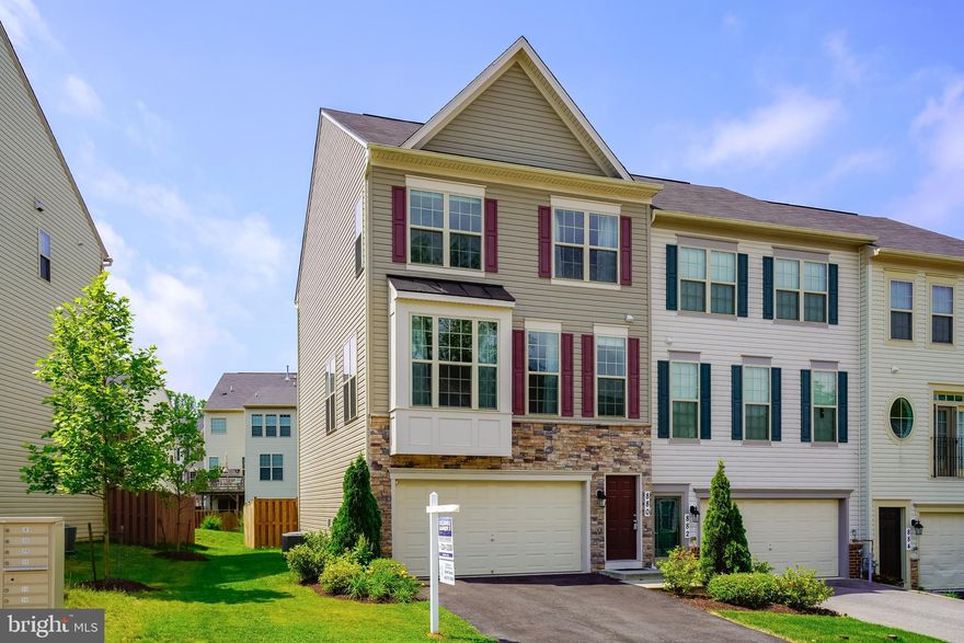 END UNIT in coveted Canterbury village! Stunning pet free home. Beautiful custom patio and fenced yard. Expresso kitchen with darker wood floors show the luxury side. The fireplace adds to the gorgeous  ambience of this home. Tot lots and  open areas for community feel.  Canterbury village is conveniently located close to HWYS for easy commute to Ft. Meade/NSA, Naval Academy, Baltimore, DC and minutes to Annapolis. Blue Ribbon Schools and much more!  Don't miss out ...these don't last long!