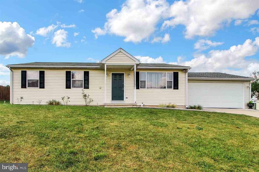 Well cared for home in quiet development. Enjoy the convenience of one floor living. Updated kitchen w/ stainless steel appliances and sep dining room w/ ceramic tile, beautiful laminate flooring throughout. Relax / entertain on your large deck.