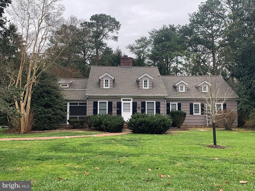 Classic Cape Cod situated on a magnificent building lot in Henlopen Acres.