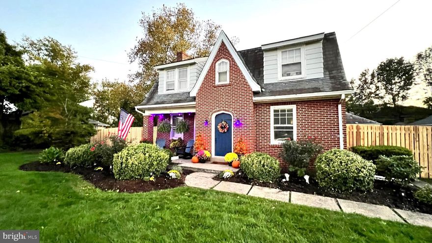 Timeless brick architecture, charming interior spaces and a generous half-acre lot combine to make this a truly special offering. This home features bright living spaces, classic details, a fireplace, hardwood flooring in select rooms, a detached two-car garage and a layout designed for comfortable everyday living. The exterior offers standout curb appeal, mature landscaping, and a patio that extends the living space outdoors. This is a property with enduring character, outdoor room to enjoy, and exceptional potential.